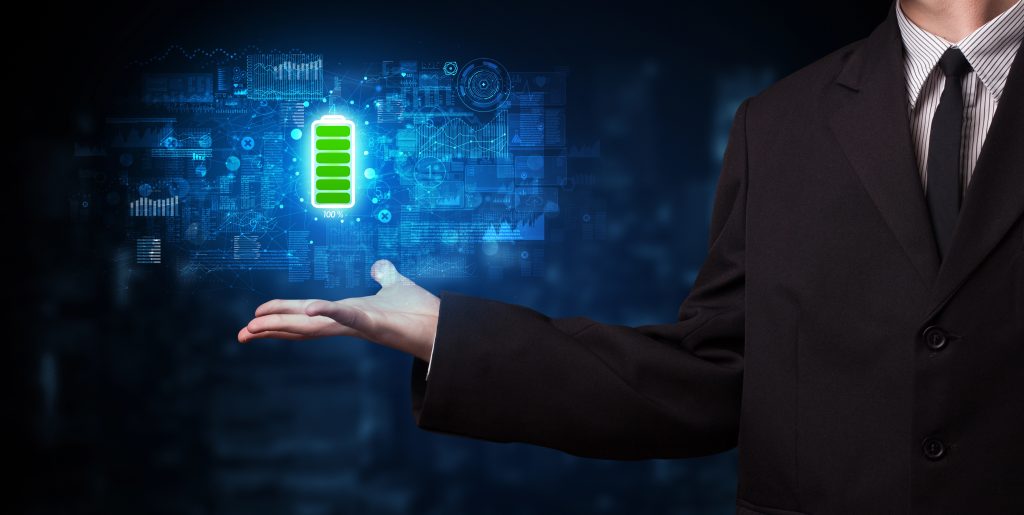 Hand holding battery